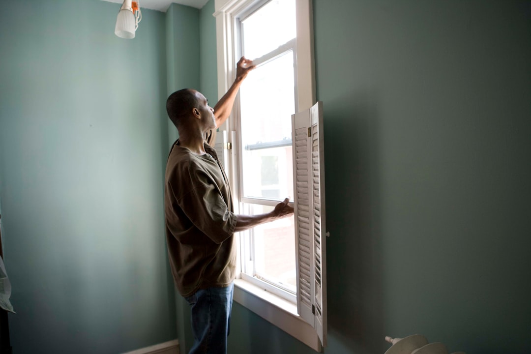 services-04 When renovating a home, you should use a damp sponge or cloth to clean dust collected on a window sill, as the dust may contain asbestos or lead-based paint. Home maintenance is an ongoing process for any homeowner, and here we see an African-American man as he was preparing a window in his home for a general cleaning.